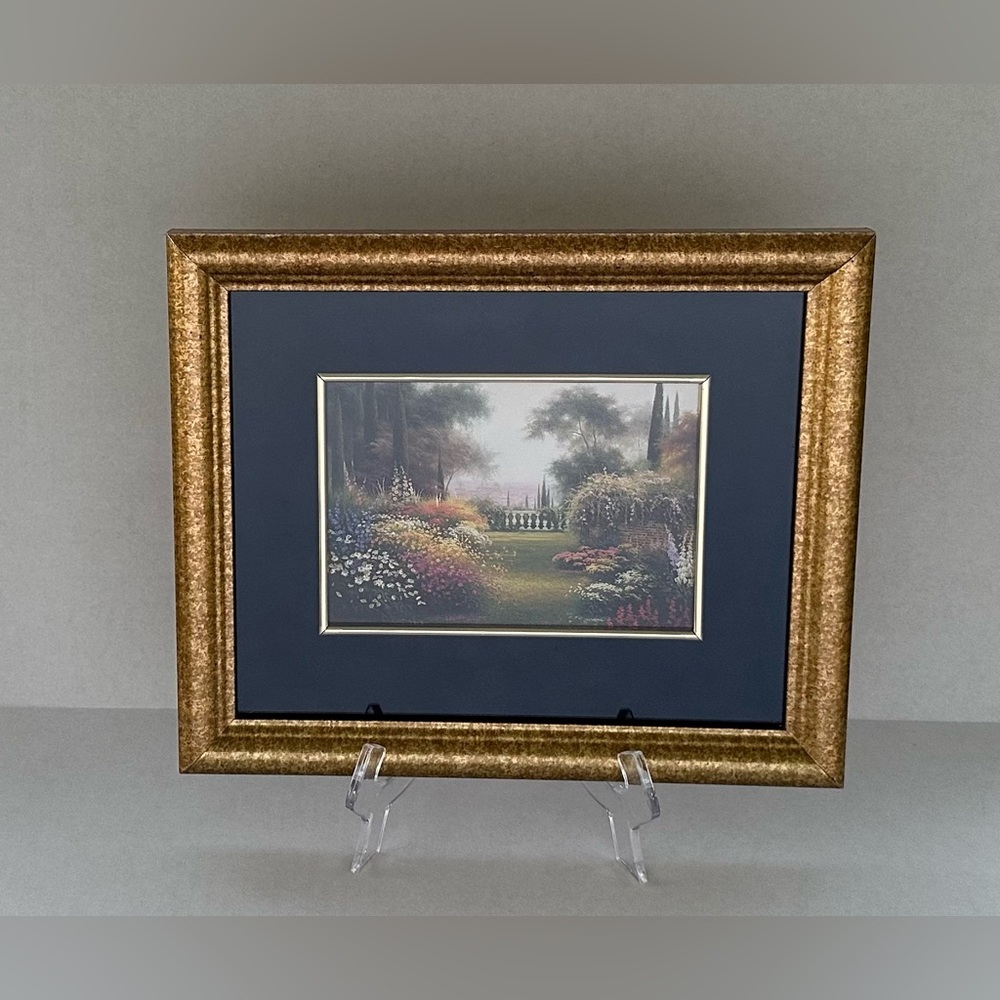 Thomas Kinkade “Garden of Grace” Framed in a Gold-Colored Frame